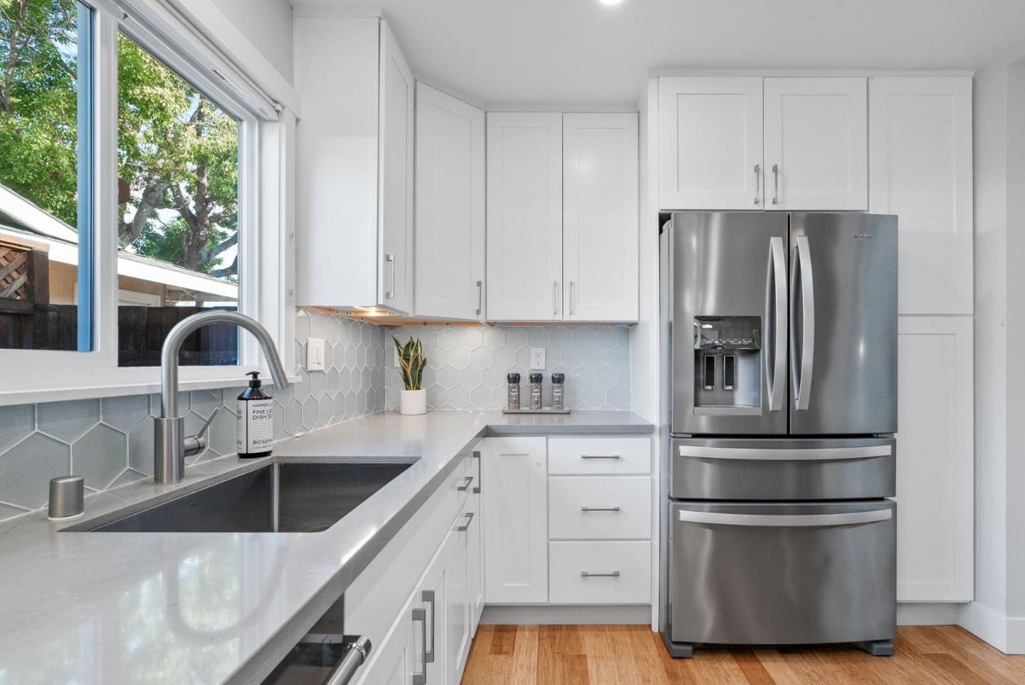 643 Crestview Drive San Jose, CA 95050 - Photo 12 of 76 a kitchen with a refrigerator sink and cabinets
