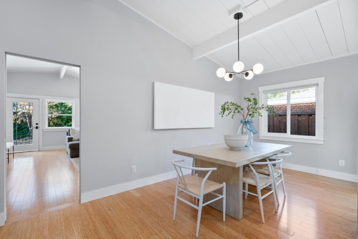 643 Crestview Drive San Jose, CA 95050 - Photo 18 of 76 a view of a dining room with furniture wooden floor and chandelier
