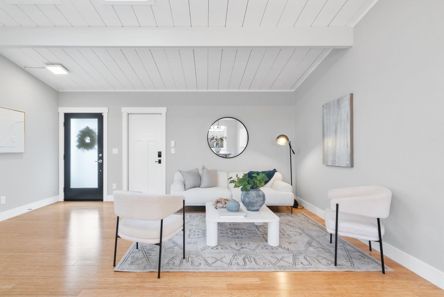 643 Crestview Drive San Jose, CA 95050 - Photo 21 of 76 a living room with furniture a clock on wall and a table