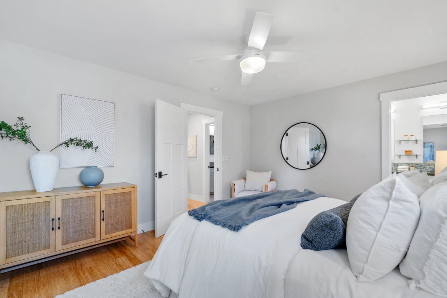 643 Crestview Drive San Jose, CA 95050 - Photo 29 of 76 a bedroom with a bed and a chandelier