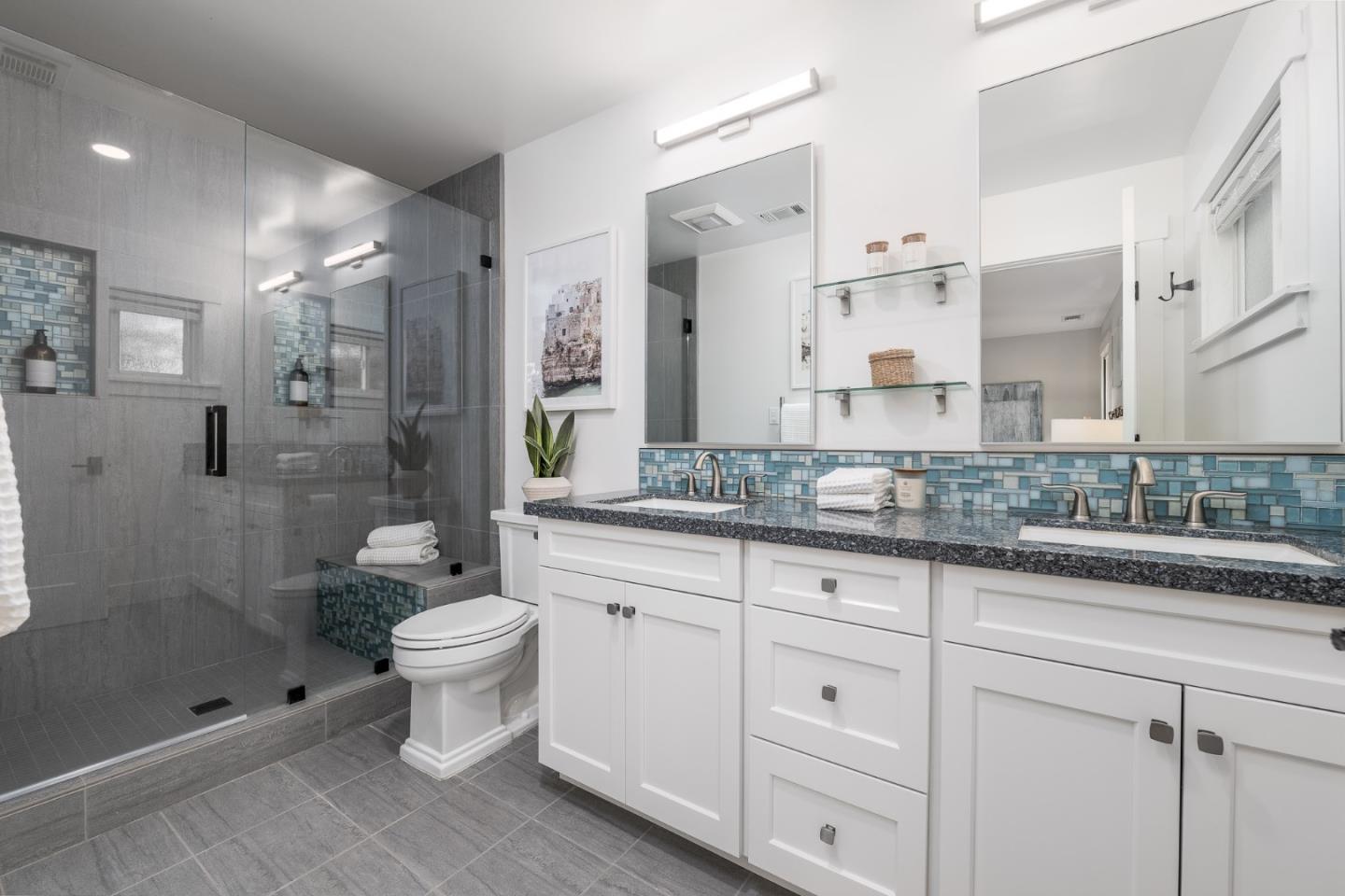 643 Crestview Drive San Jose, CA 95050 - Photo 32 of 76 a bathroom with a shower sink vanity and toilet