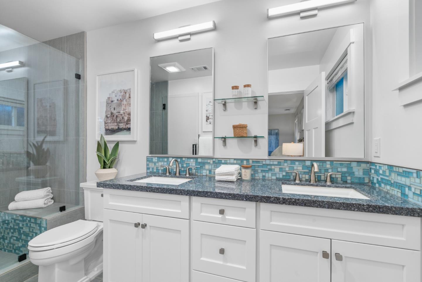 643 Crestview Drive San Jose, CA 95050 - Photo 35 of 76 a bathroom with a granite countertop sink a toilet a large mirror and shower