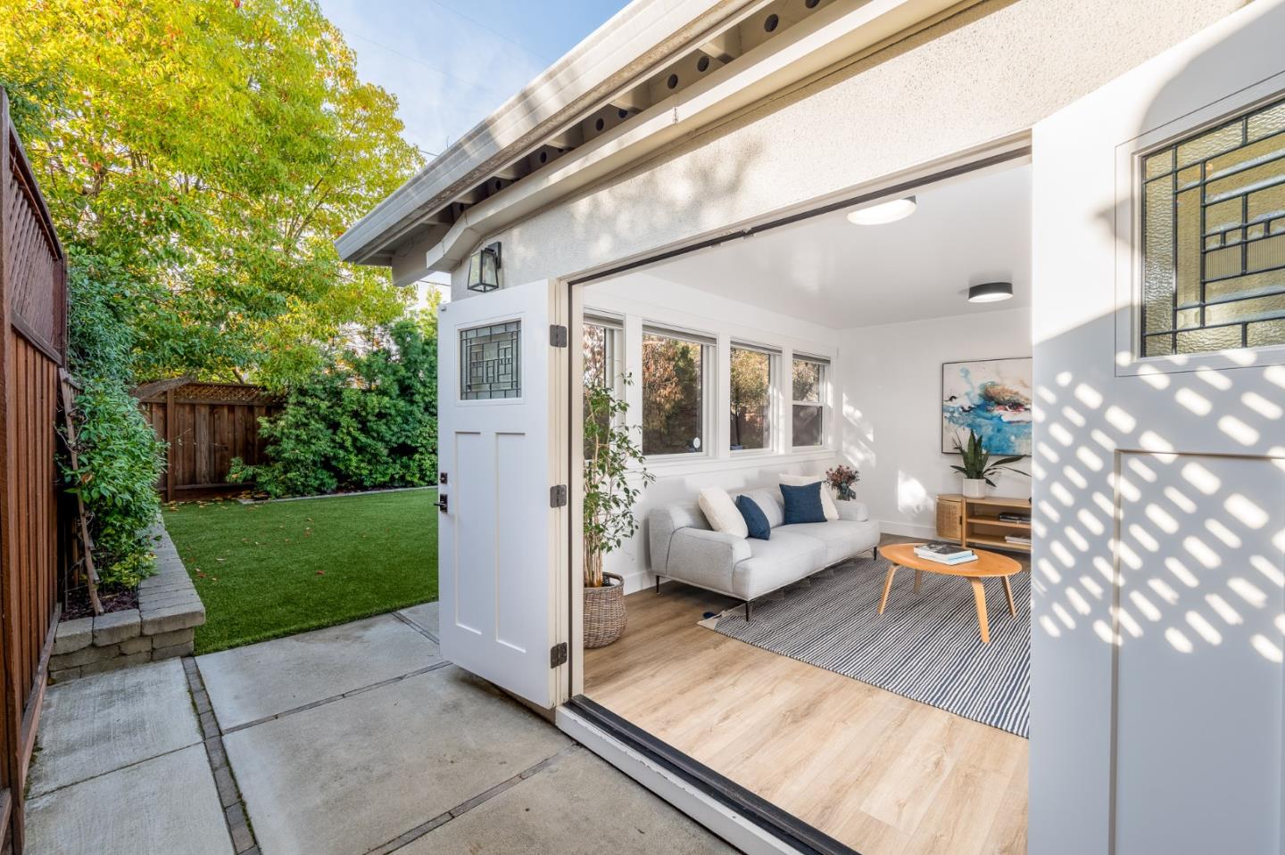 643 Crestview Drive San Jose, CA 95050 - Photo 46 of 76 a view of a patio with couches and table potted plants and large tree