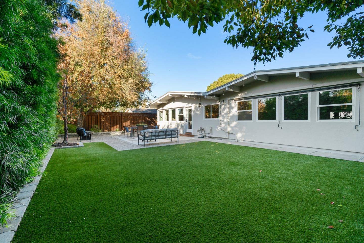 643 Crestview Drive San Jose, CA 95050 - Photo 51 of 76 a front view of a house with a garden and trees