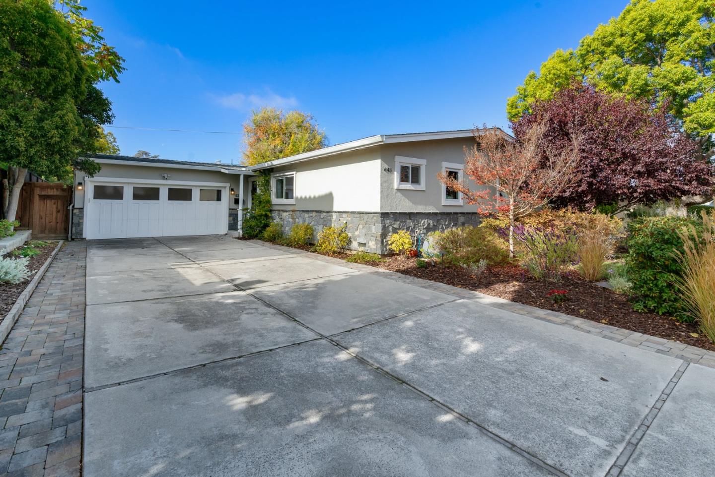 643 Crestview Drive San Jose, CA 95050 - Photo 65 of 76 a front view of a house with a yard and garage
