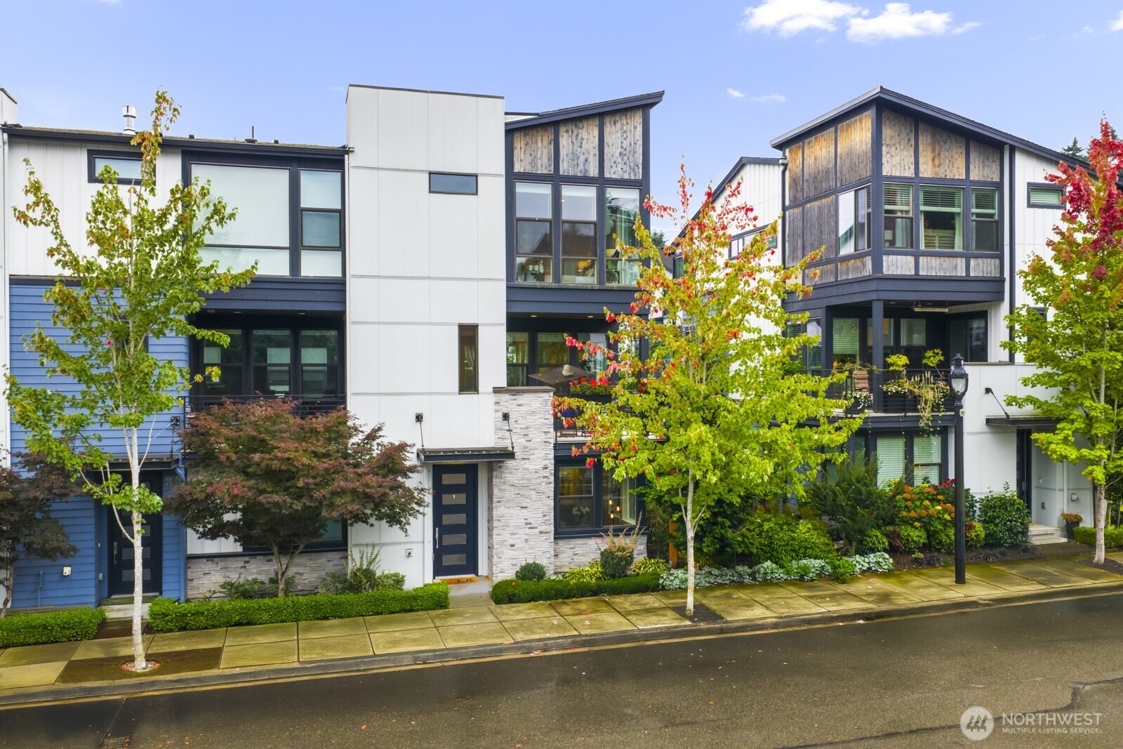 a front view of a house with street