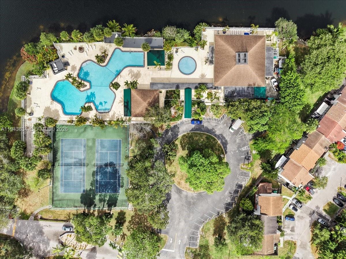 7120 Southwest 112th Avenue Miami, FL 33173 - Photo 26 of 27 an aerial view of a swimming pool a yard and outdoor seating