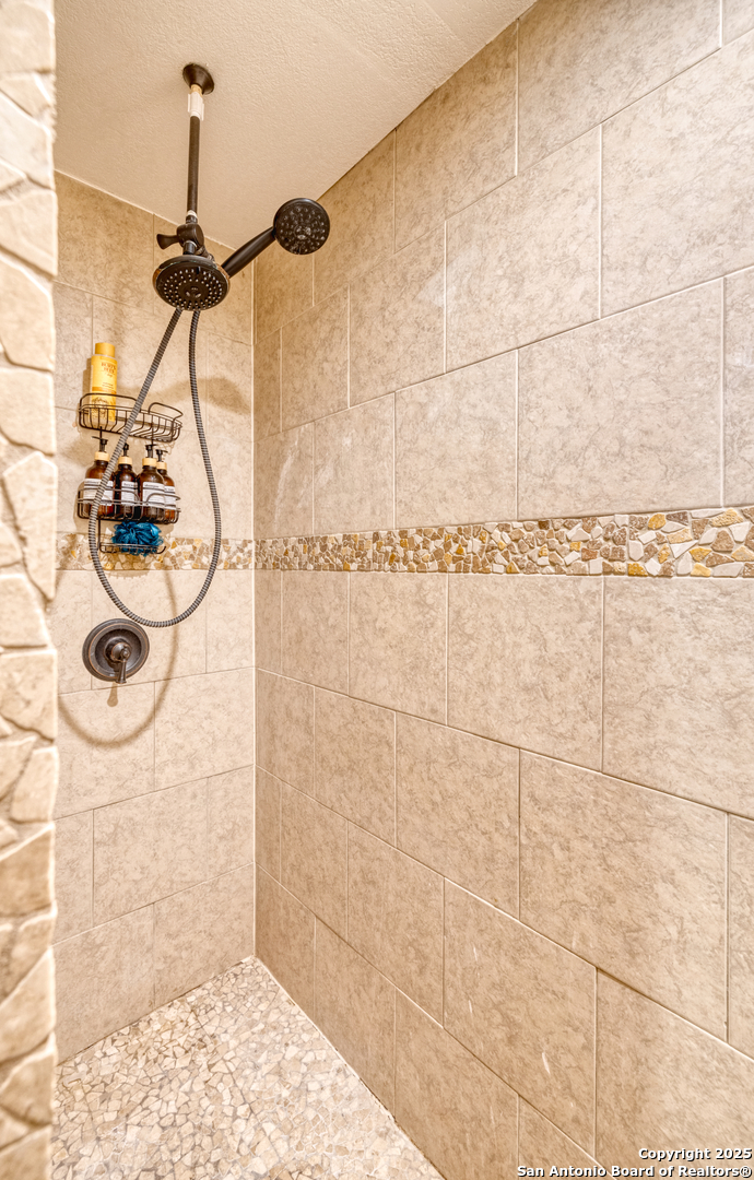 155 Avenida Juarez Road Brackettville, TX 78832 - Photo 15 of 37 a bathroom with a shower