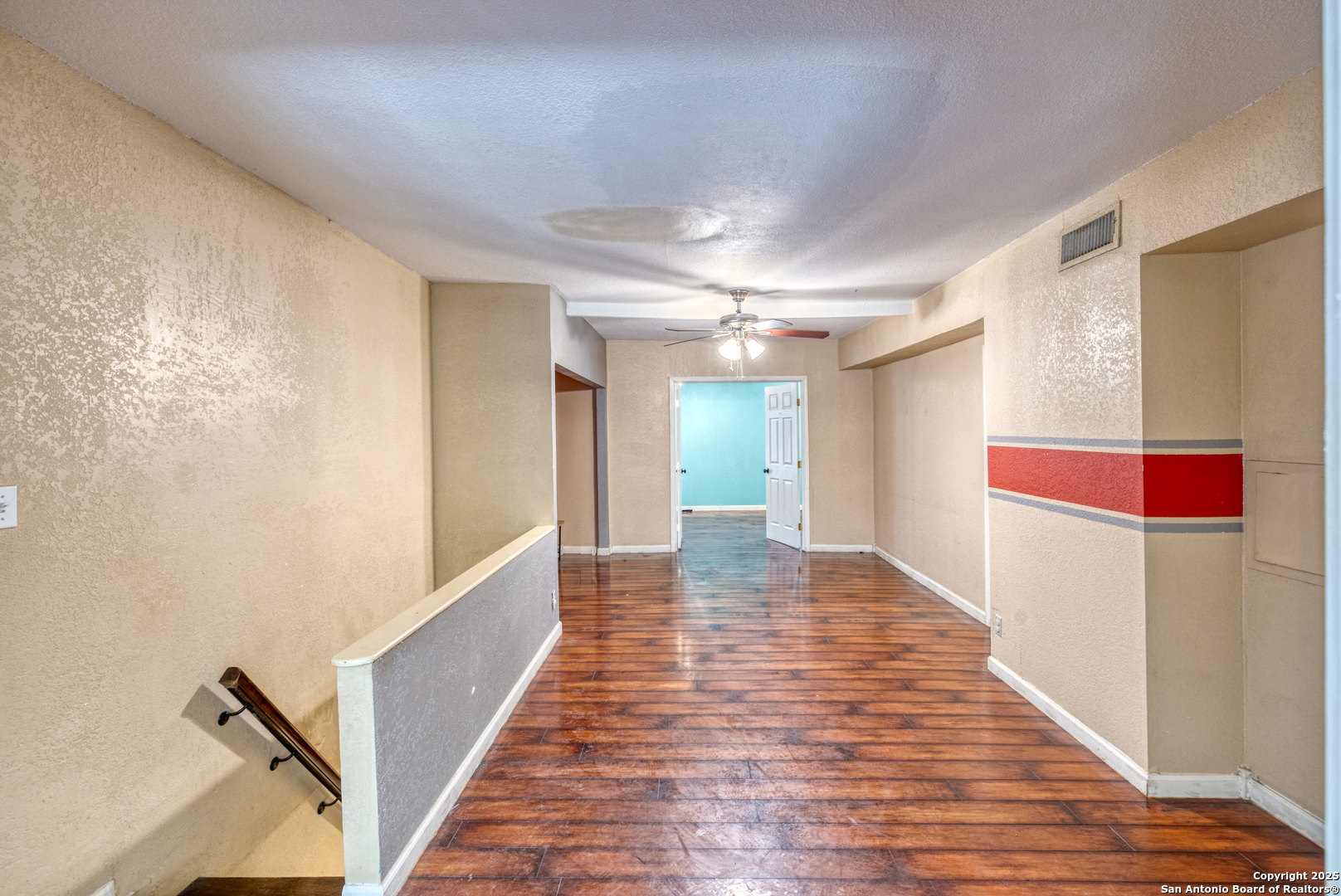155 Avenida Juarez Road Brackettville, TX 78832 - Photo 19 of 37 a view of a hallway with wooden floor