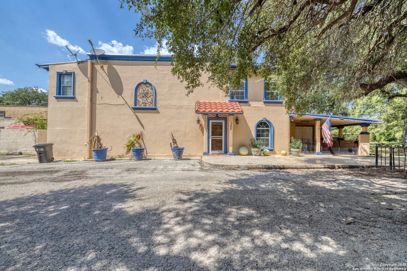 155 Avenida Juarez Road Brackettville, TX 78832 - Photo 2 of 37 a view of a house with a yard and garage