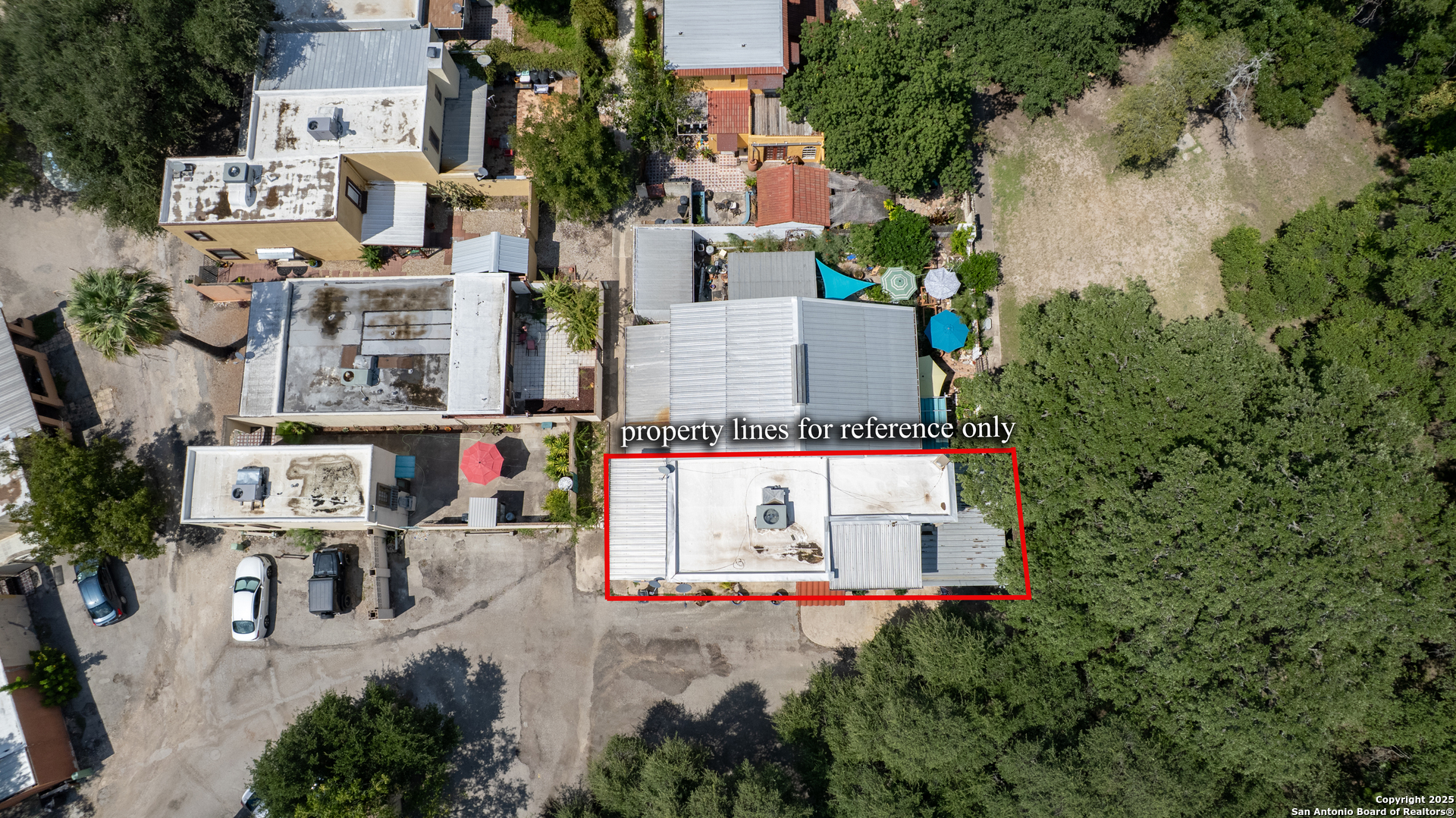 155 Avenida Juarez Road Brackettville, TX 78832 - Photo 31 of 37 an aerial view of residential houses with outdoor space and parking