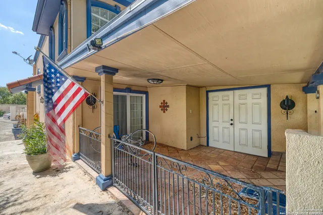 a kitchen with stainless steel appliances kitchen island granite countertop wooden floors and wooden cabinets