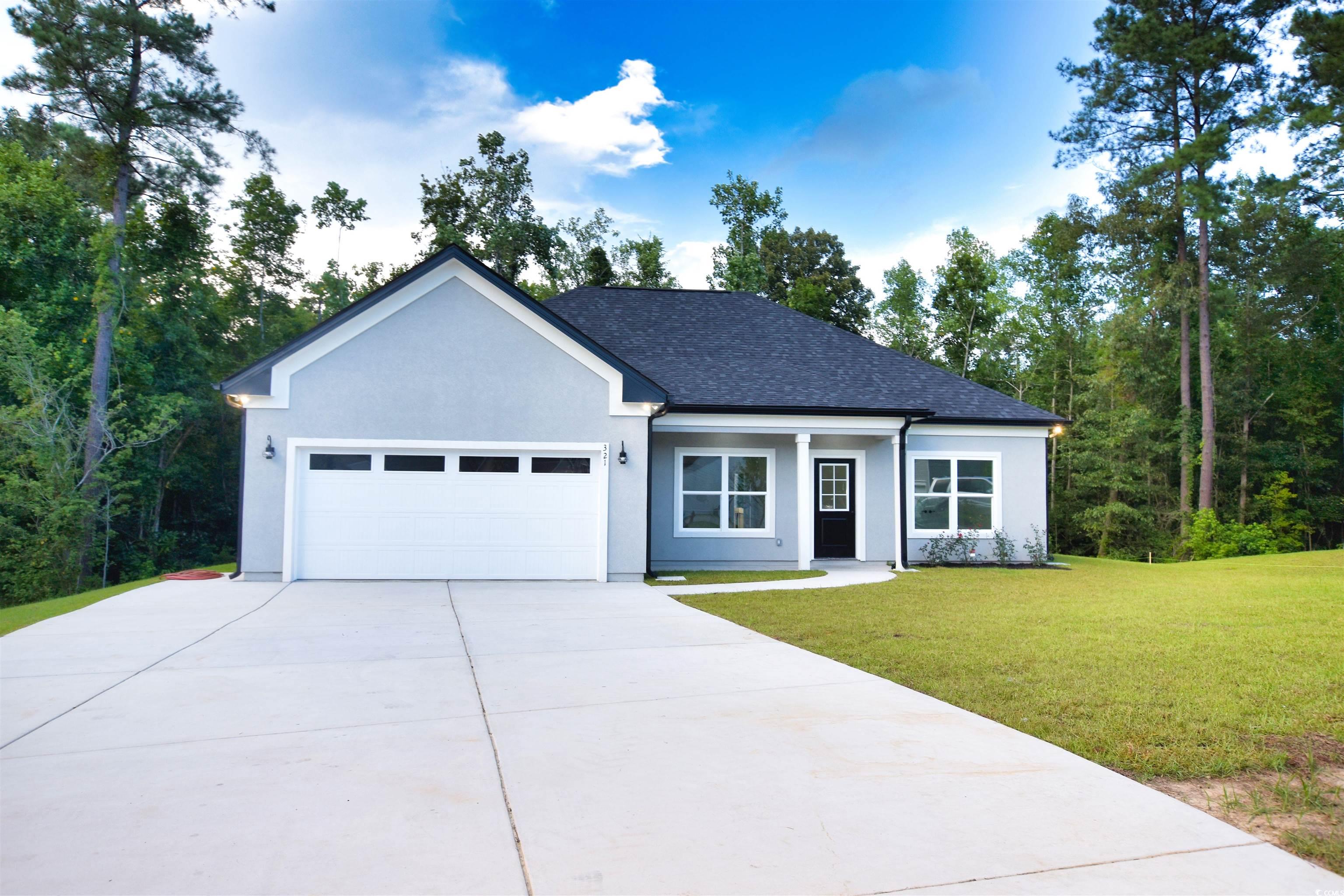321 Stone Crop Court Loris, SC 29569 - Photo 1 of 25 View of front of property with a garage and a fron