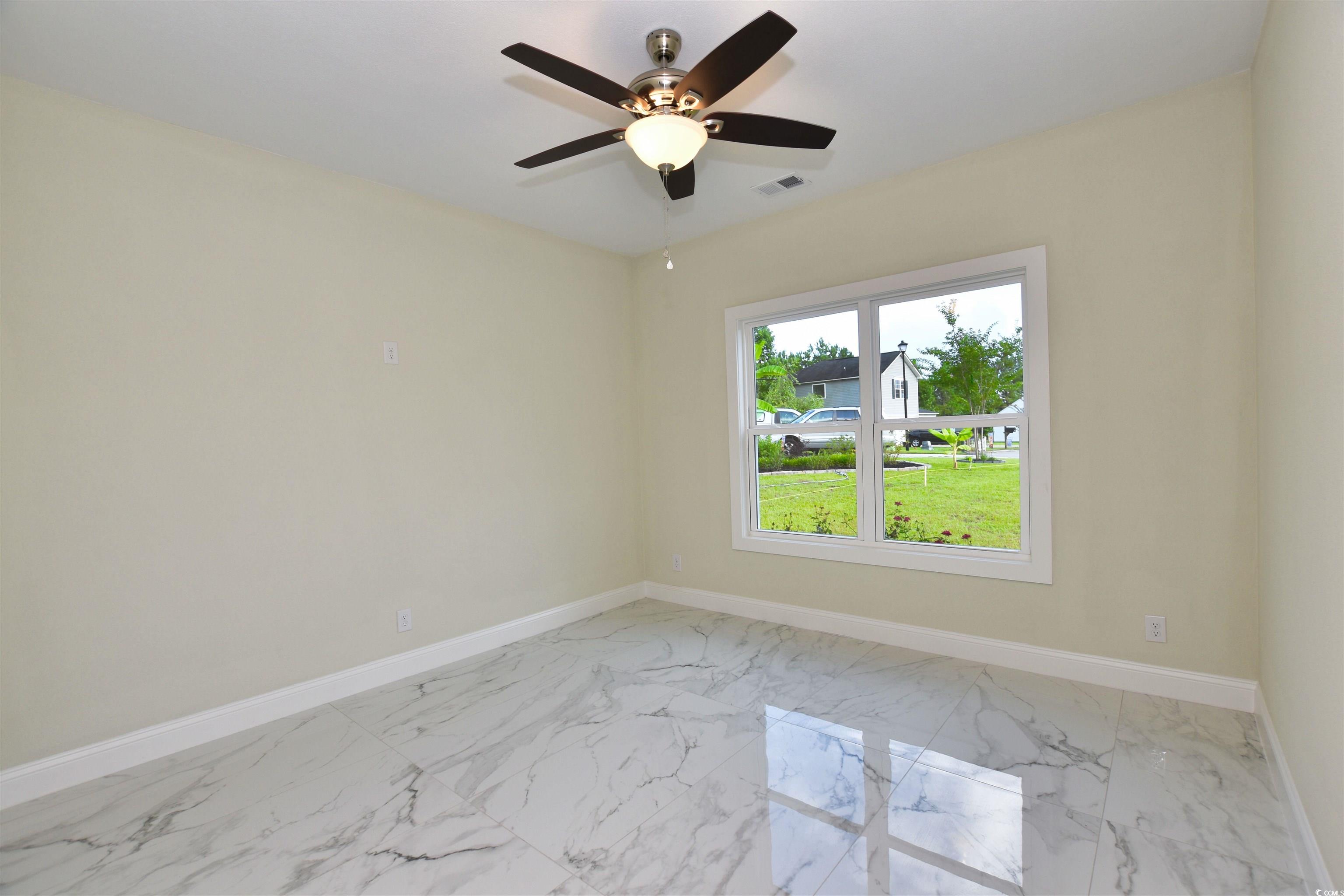 321 Stone Crop Court Loris, SC 29569 - Photo 18 of 25 Full bathroom featuring vanity, tile patterned flo