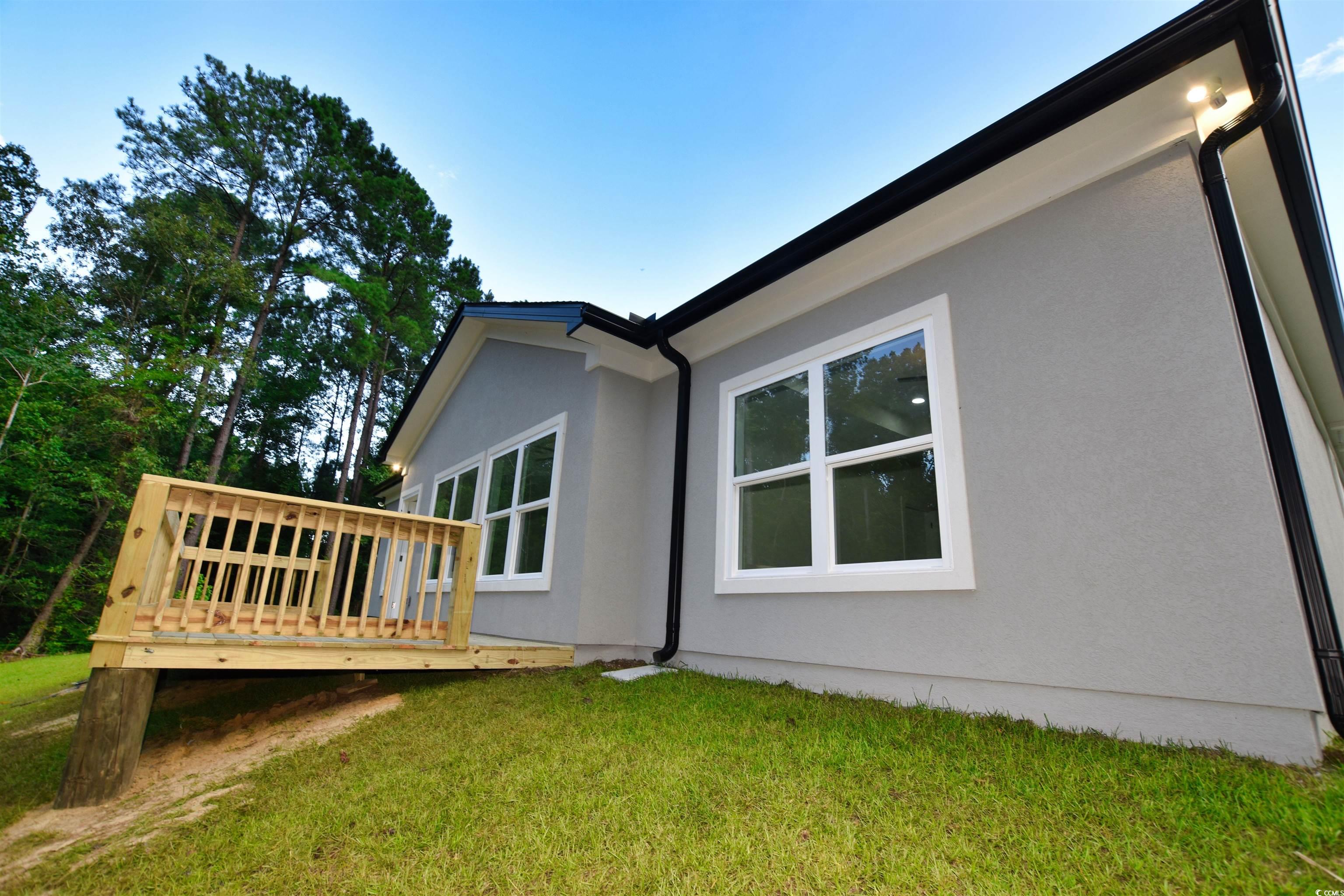 321 Stone Crop Court Loris, SC 29569 - Photo 22 of 25 View of wooden terrace