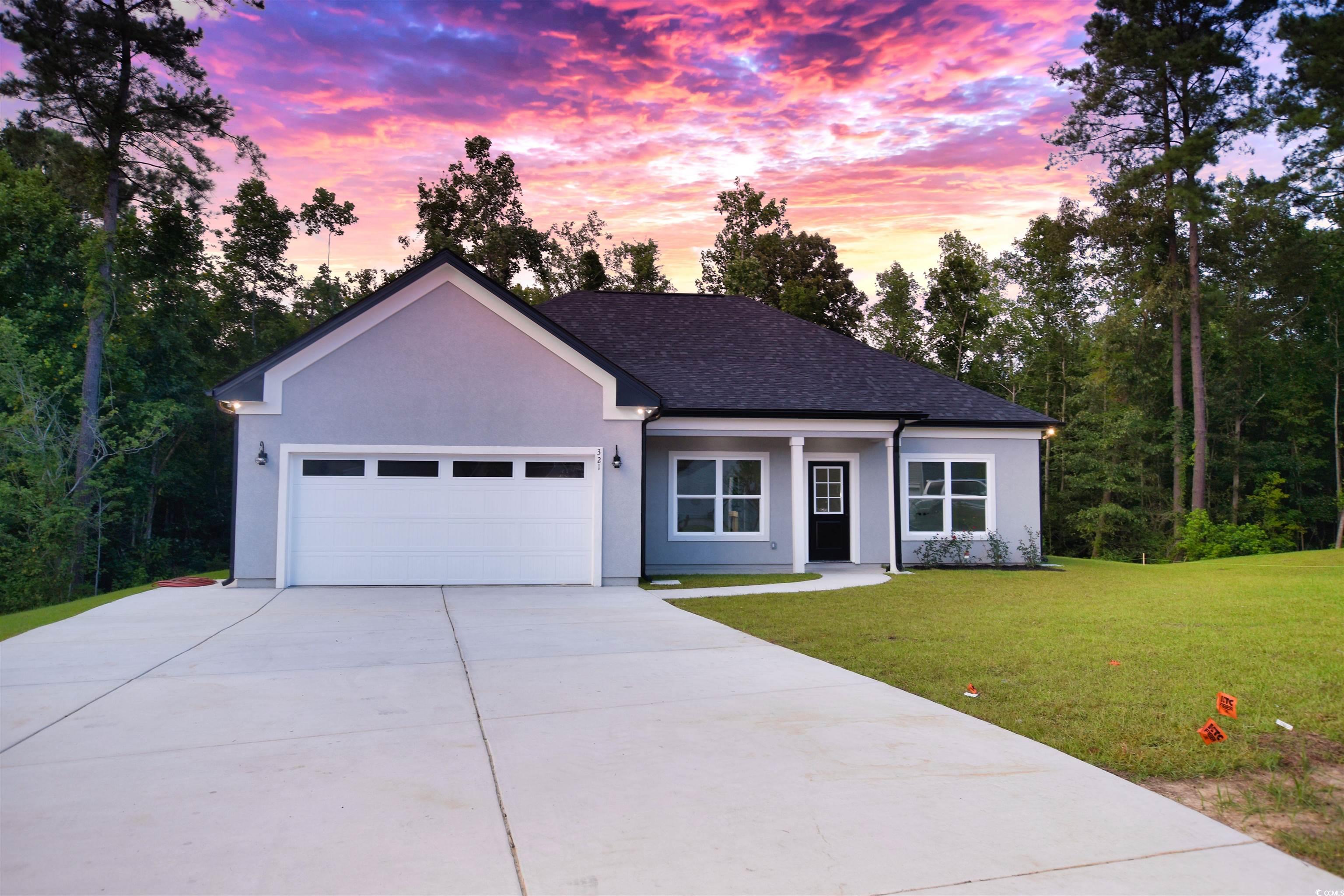 321 Stone Crop Court Loris, SC 29569 - Photo 25 of 25 Exterior space with a yard and a wooden deck