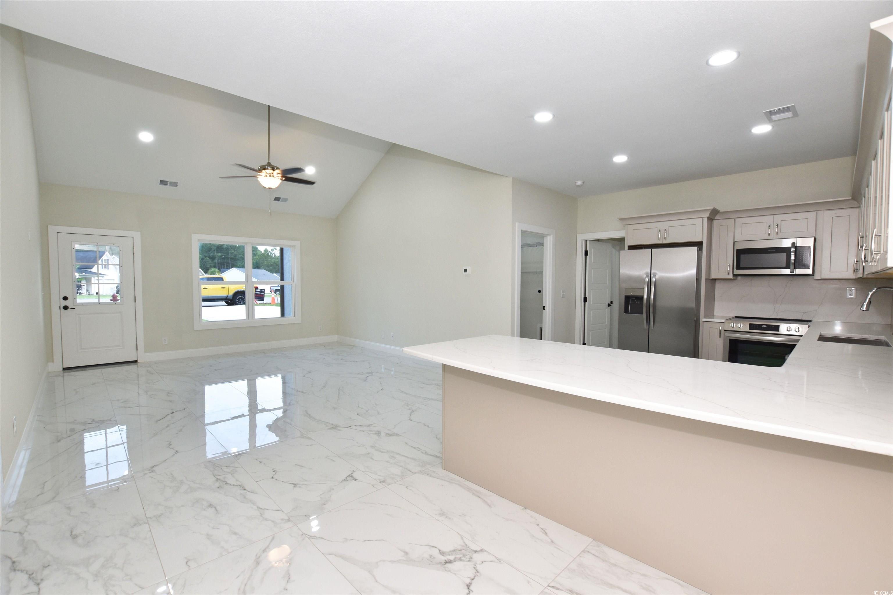 321 Stone Crop Court Loris, SC 29569 - Photo 8 of 25 Kitchen with sink, tasteful backsplash, kitchen pe