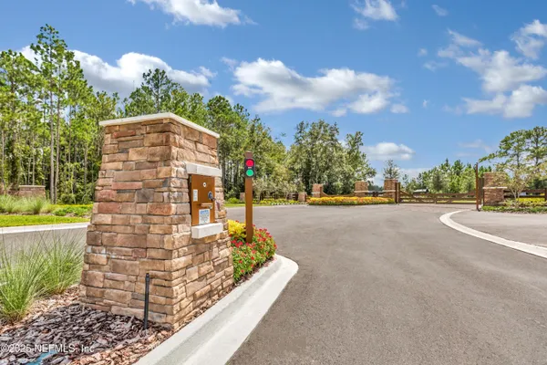 a view of a street with houses on both side