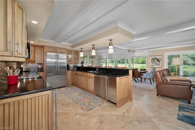 $595,000 | 112 Wilderness Drive, Unit 124, Naples, FL 34105