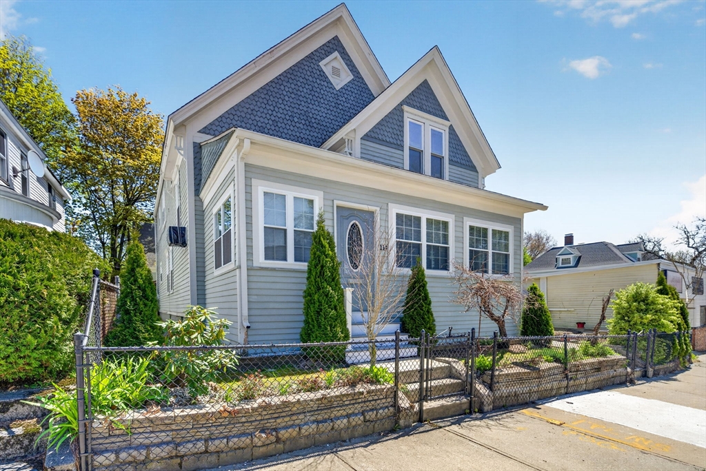 114 Lovell Street Worcester, MA 01603 - Photo 1 of 32 front view of a house with potted plants