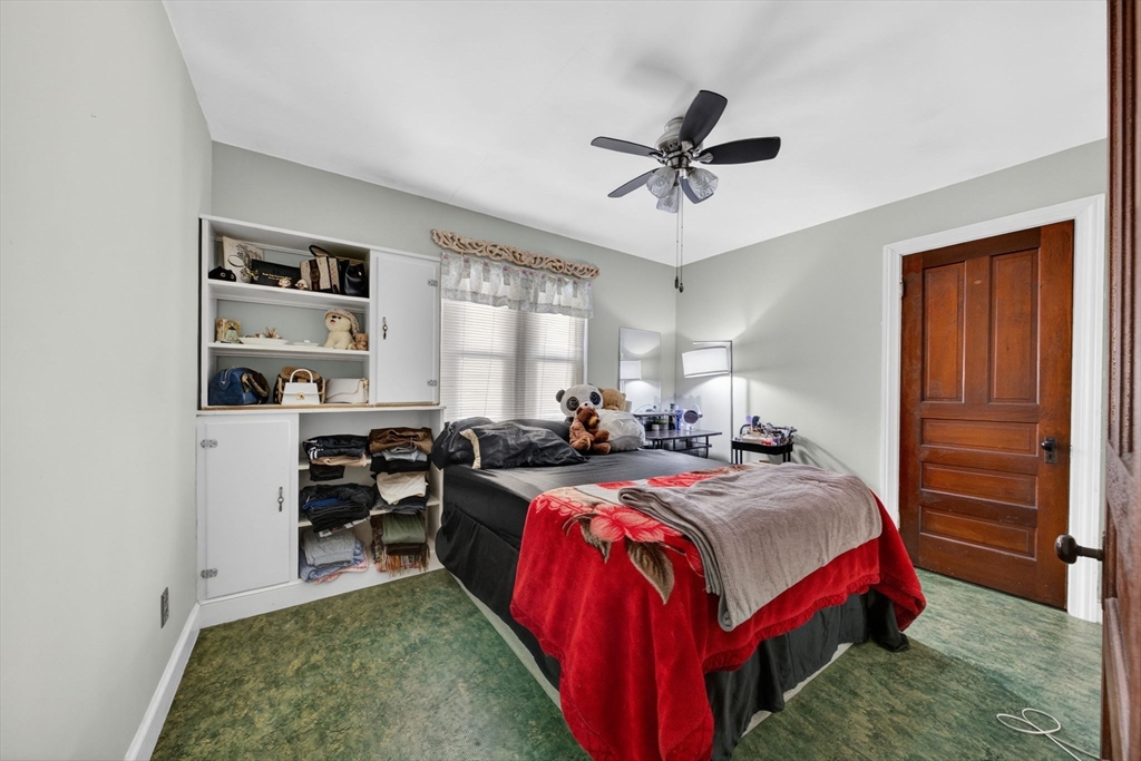 114 Lovell Street Worcester, MA 01603 - Photo 14 of 32 a bedroom with bed and a window