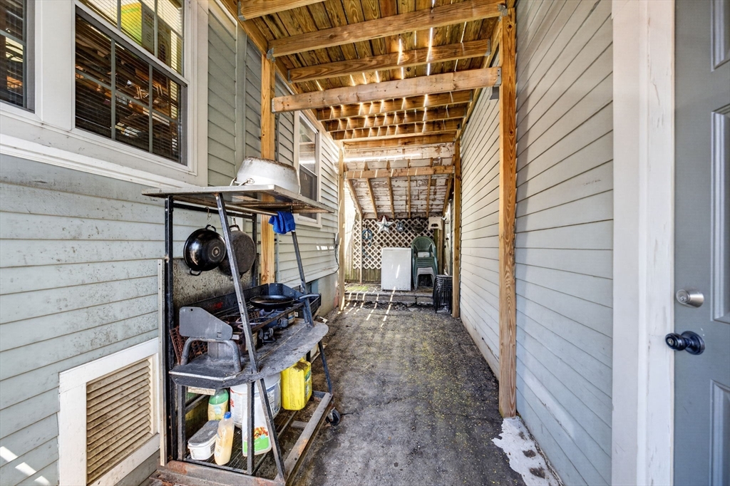 114 Lovell Street Worcester, MA 01603 - Photo 23 of 32 a view of entryway with wooden walls