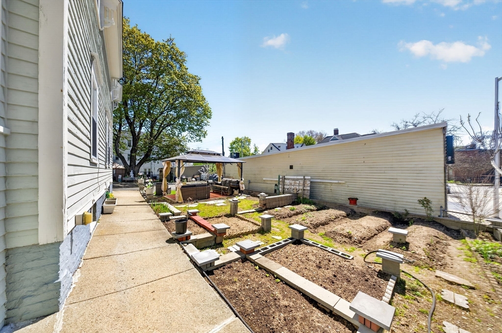114 Lovell Street Worcester, MA 01603 - Photo 27 of 32 a view of a patio with couches and potted plants