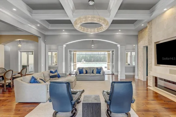 a kitchen with stainless steel appliances granite countertop a stove top oven a sink a counter space and cabinets