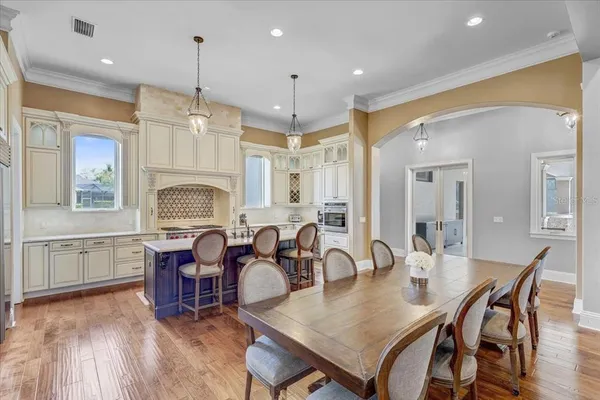 a bedroom with a bed and a table