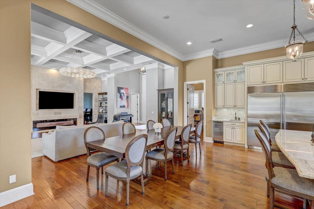 2620 Tylers Riv Run Lutz, FL 33559 - Photo 25 of 87 a view of a dining room with furniture window and wooden floor