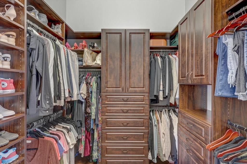2620 Tylers Riv Run Lutz, FL 33559 - Photo 36 of 87 a view of walk in closet with clothes and shoes