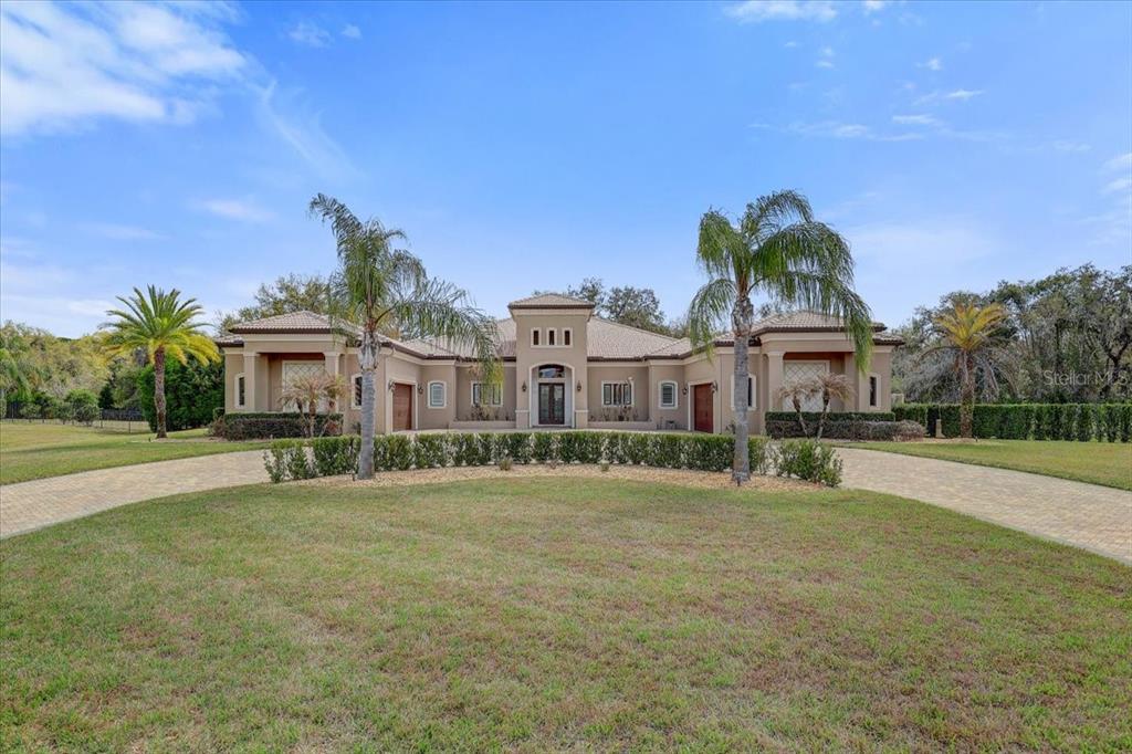 2620 Tylers Riv Run Lutz, FL 33559 - Photo 4 of 87 a view of house with outdoor space and sitting area