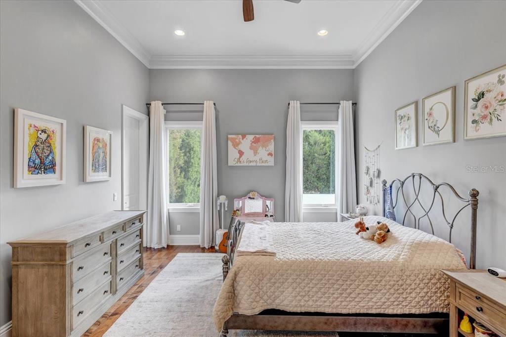 2620 Tylers Riv Run Lutz, FL 33559 - Photo 44 of 87 a bedroom with a bed and a table