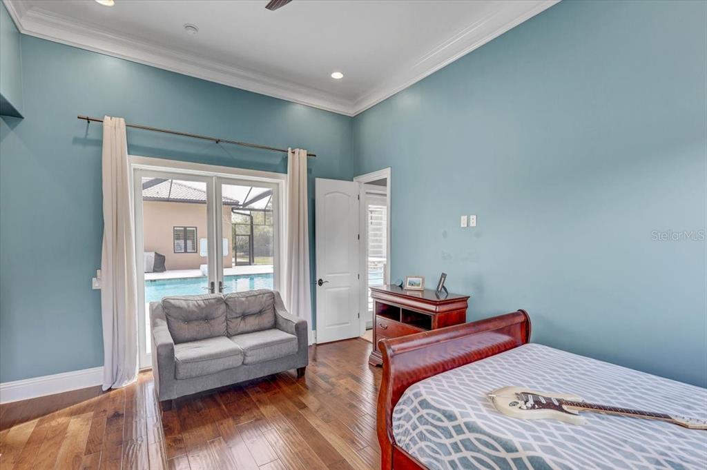 2620 Tylers Riv Run Lutz, FL 33559 - Photo 50 of 87 a bedroom with furniture and a large window