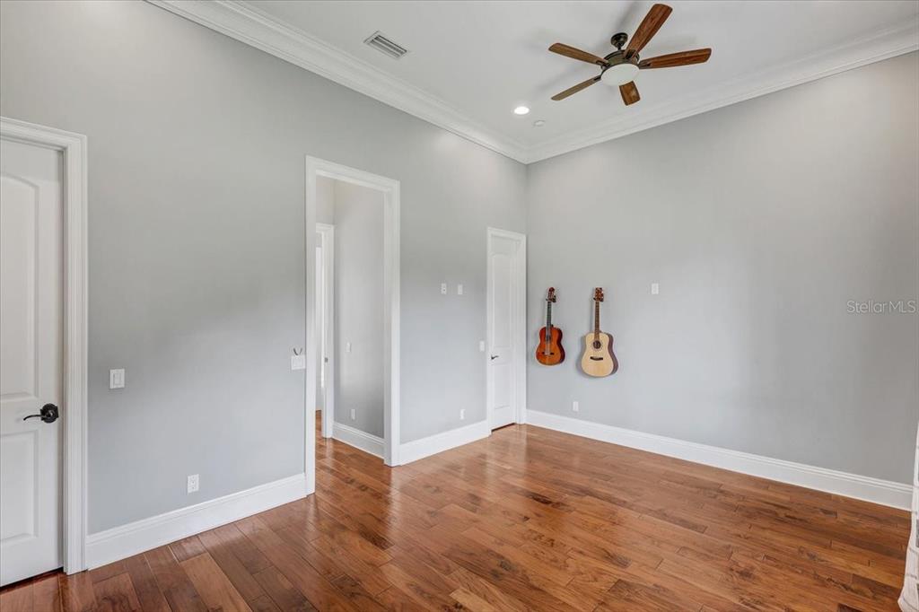 2620 Tylers Riv Run Lutz, FL 33559 - Photo 55 of 87 an empty room with wooden floor closet and windows