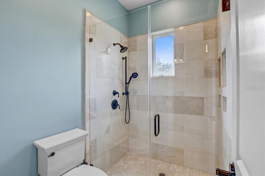 2620 Tylers Riv Run Lutz, FL 33559 - Photo 58 of 87 a white toilet sitting next to a bathroom