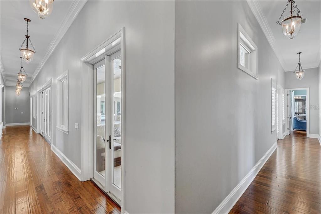 2620 Tylers Riv Run Lutz, FL 33559 - Photo 69 of 87 a view of a hallway with wooden floor