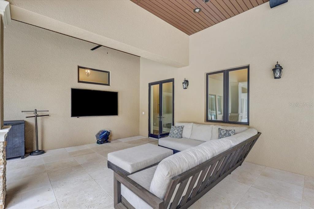 2620 Tylers Riv Run Lutz, FL 33559 - Photo 82 of 87 a bedroom with a bed and a flat screen tv