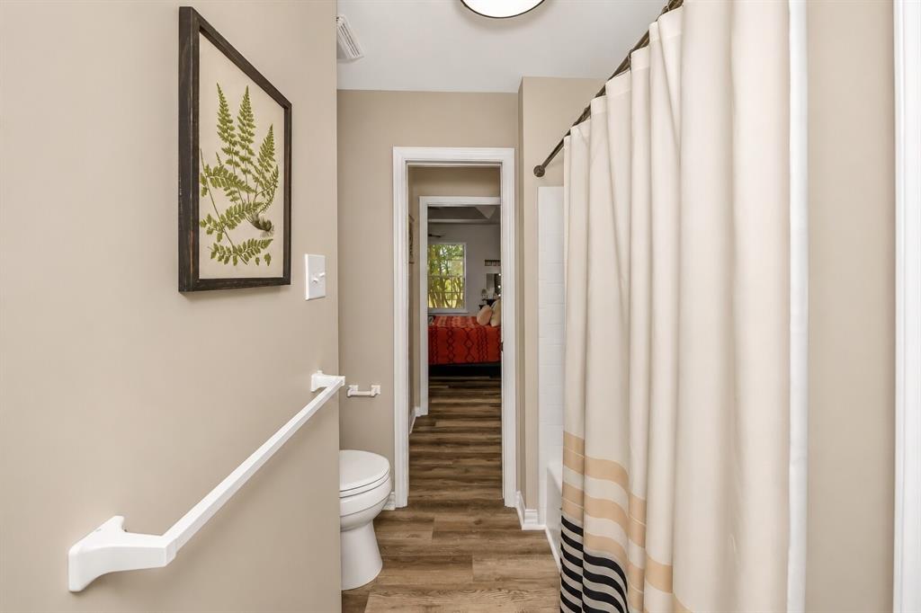 3817 Ganzer Road West Denton, TX 76207 - Photo 20 of 40 The Jack-and-Jill bathroom connects the two upstairs bedrooms and features a practical shower/tub combo that works for all ages. The layout keeps everything easy and efficient, with each bedroom having direct access while still maintaining privacy. It’s a bright, functional space designed for everyday living.