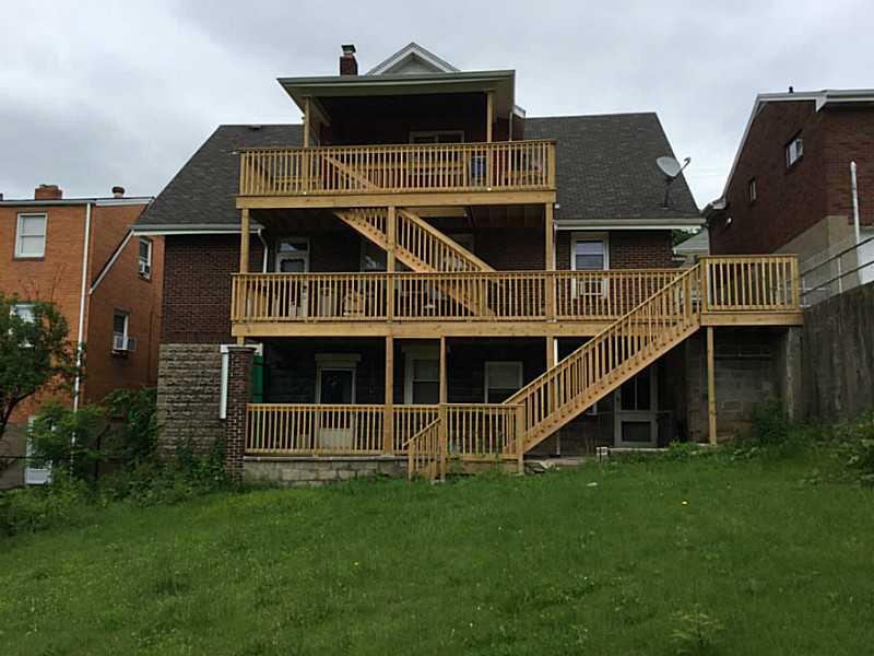 407 Elm Road Ambridge, PA 15003 - Photo 2 of 25 Exterior Back. New porches and stairs for each unit