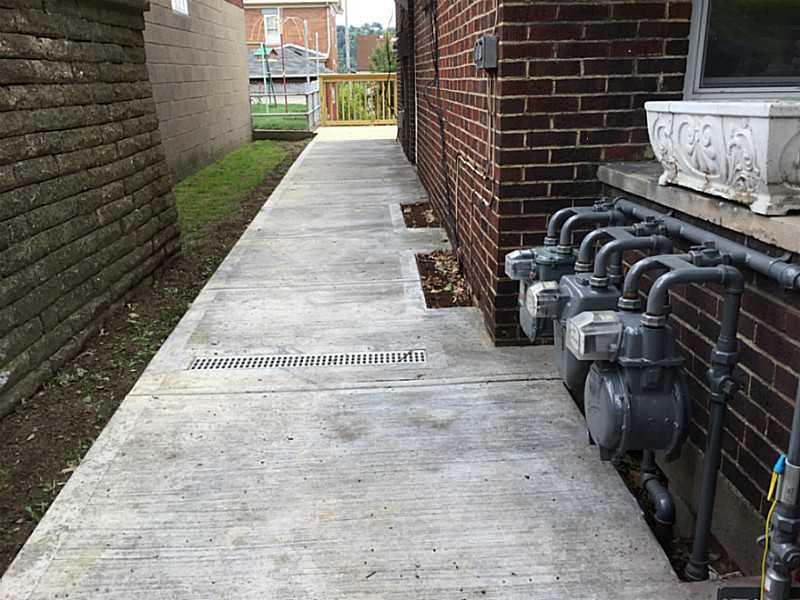 407 Elm Road Ambridge, PA 15003 - Photo 3 of 25 Other. New sidewalk to 2nd fl and lower level unit