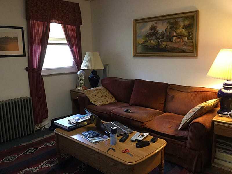 407 Elm Road Ambridge, PA 15003 - Photo 21 of 25 Living Room. Lower level unit