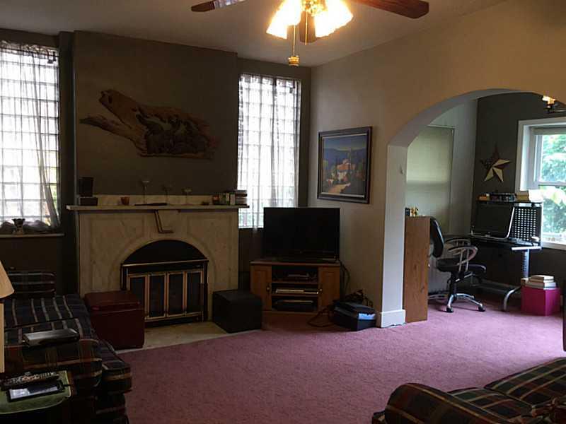 407 Elm Road Ambridge, PA 15003 - Photo 5 of 25 Living Room. 1st Fl Unit Living Room with computer nook