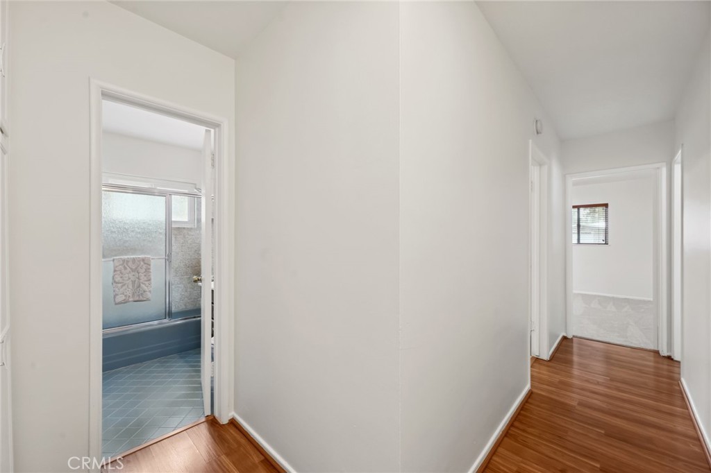 3035 Priscilla Street Riverside, CA 92506 - Photo 16 of 45 a view of a bathroom from a hallway