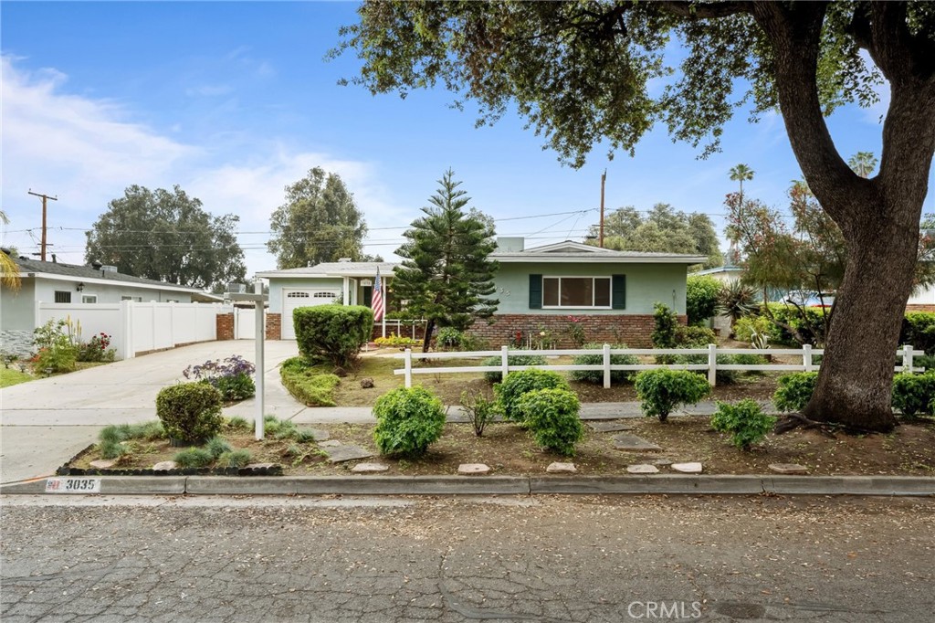 3035 Priscilla Street Riverside, CA 92506 - Photo 2 of 45 a front view of a house with garden