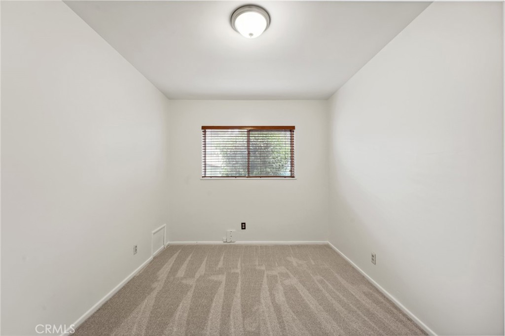 3035 Priscilla Street Riverside, CA 92506 - Photo 24 of 45 an empty room with a window