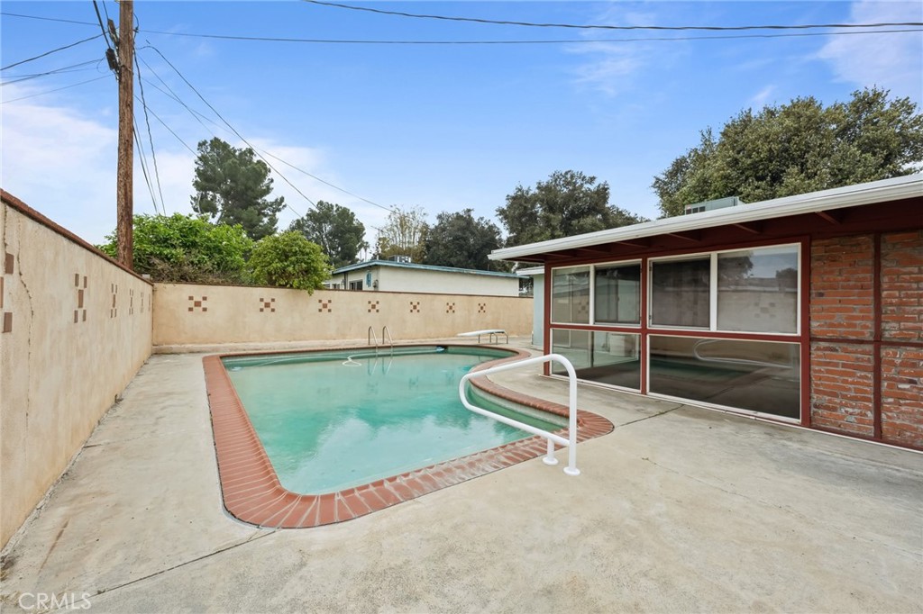 3035 Priscilla Street Riverside, CA 92506 - Photo 38 of 45 a view of a house with a backyard