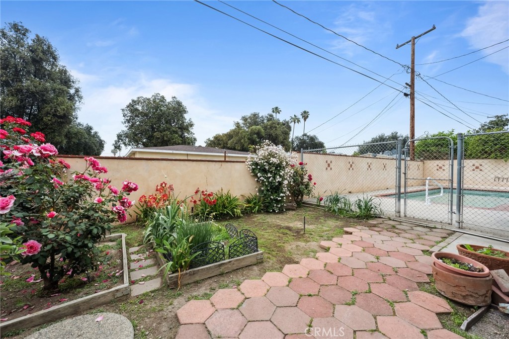 3035 Priscilla Street Riverside, CA 92506 - Photo 41 of 45 a view of a backyard with potted plants