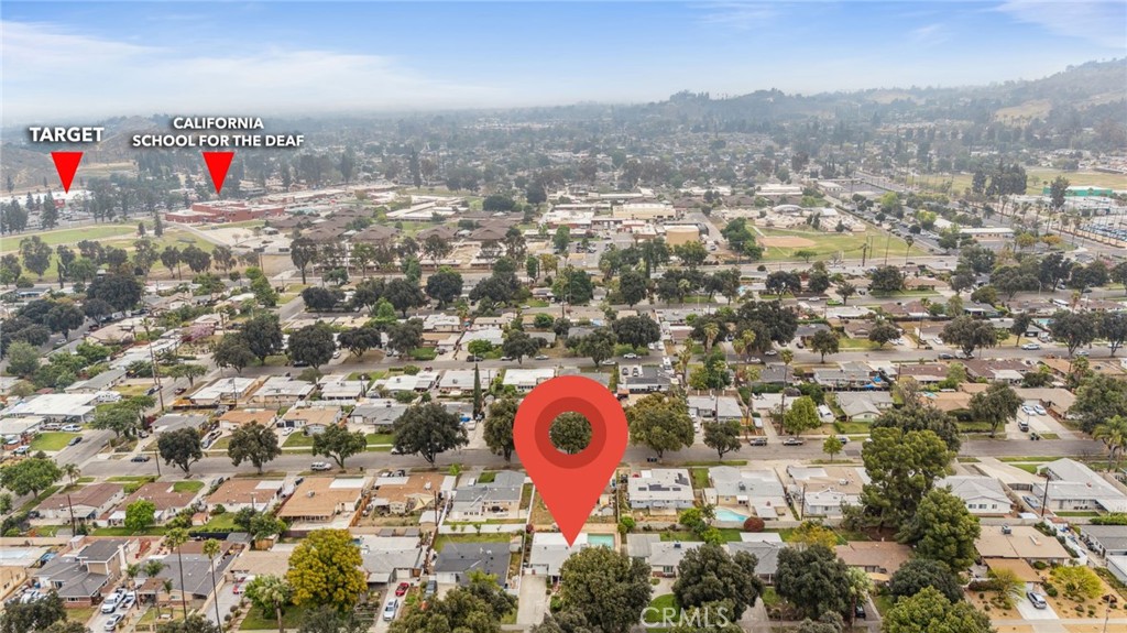 3035 Priscilla Street Riverside, CA 92506 - Photo 43 of 45 an aerial view of a house with a backyard and a tree