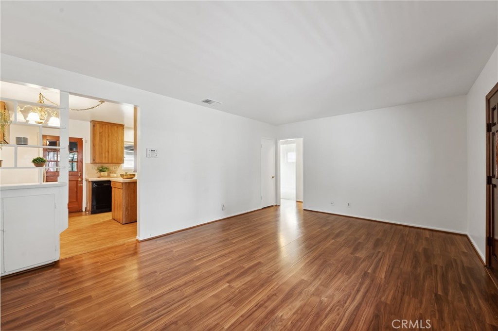3035 Priscilla Street Riverside, CA 92506 - Photo 8 of 45 a view of a kitchen with wooden floor and a kitchen